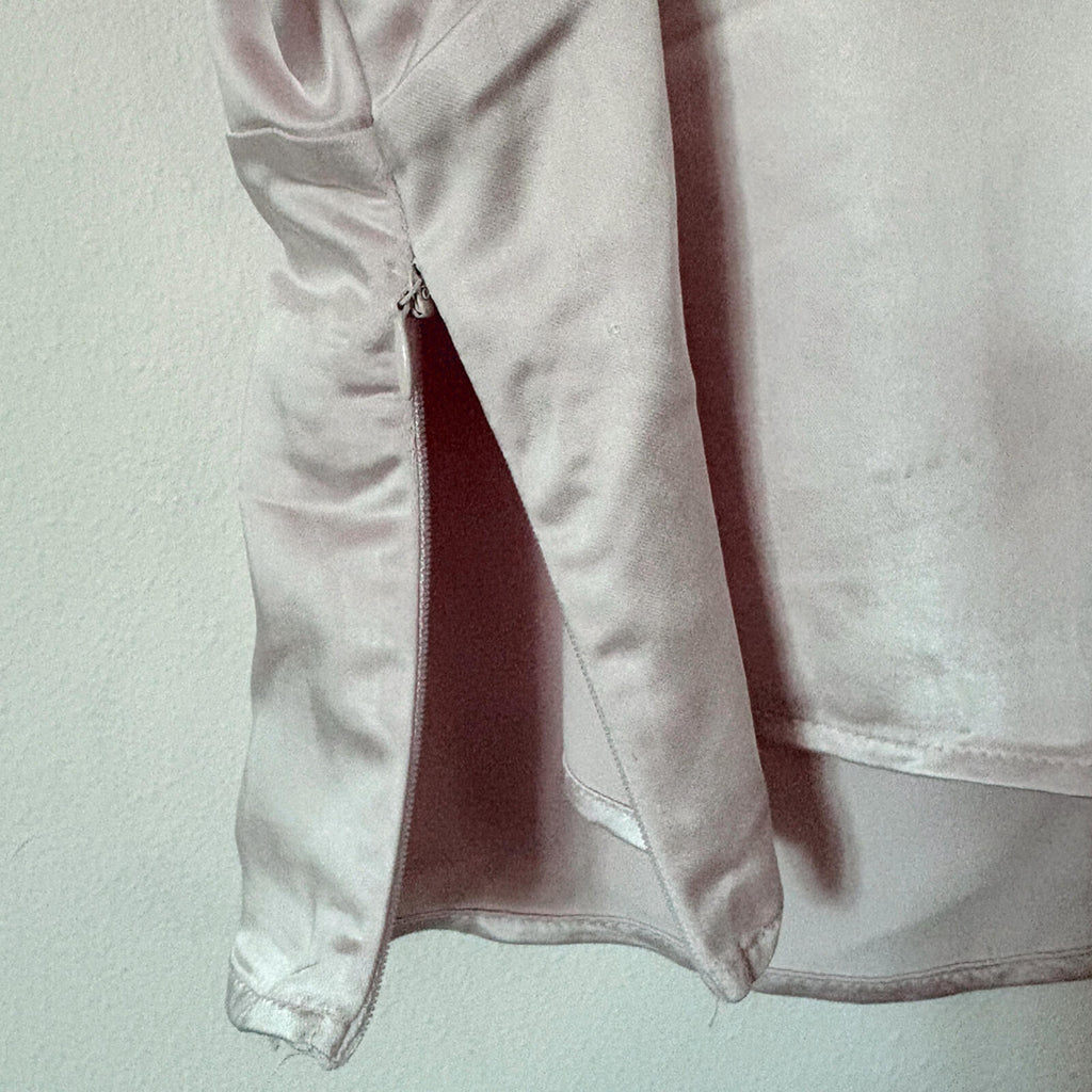 Elegant Cream Satin Camisole Top with Black Bow Accent