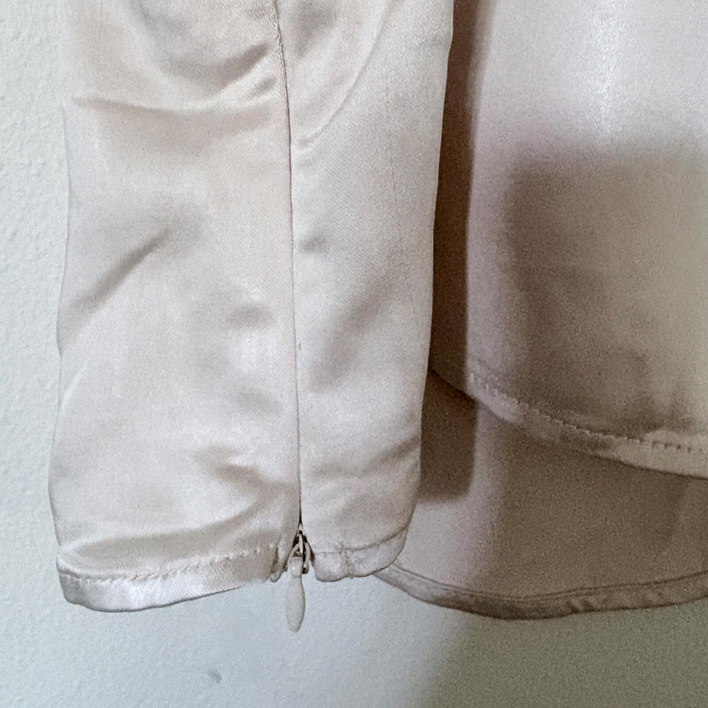 Elegant Cream Satin Camisole Top with Black Bow Accent
