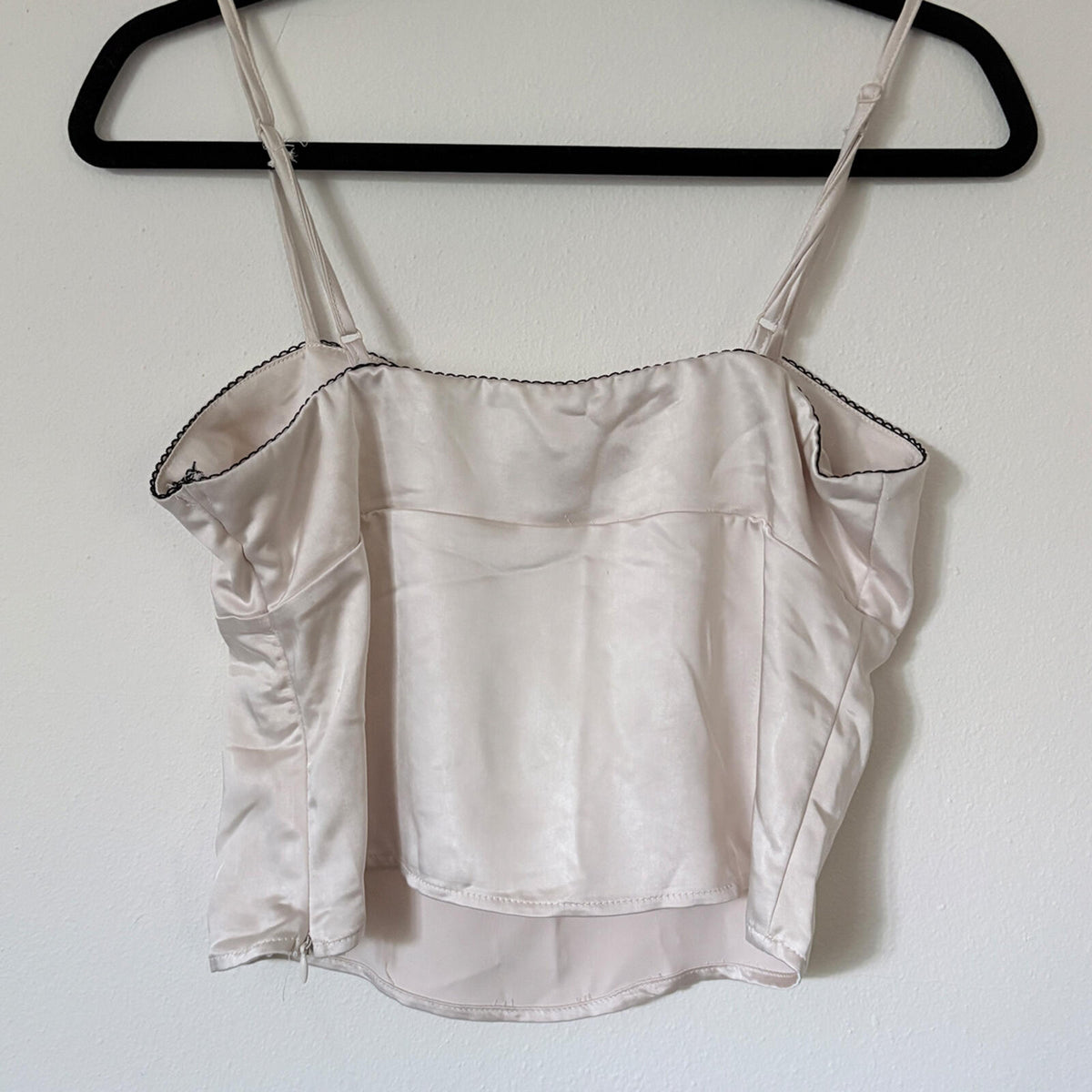 Elegant Cream Satin Camisole Top with Black Bow Accent