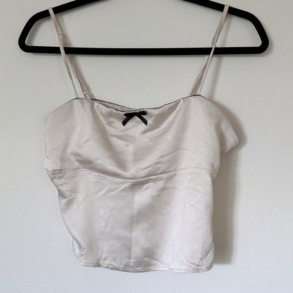 Elegant Cream Satin Camisole Top with Black Bow Accent