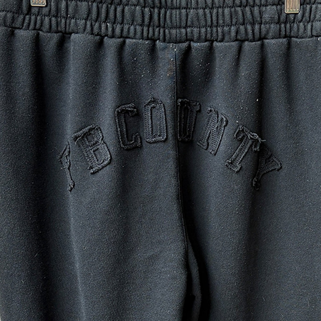 FB County Black Sweatpants Size L with Frayed Hem Detail