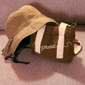 Brown Canvas Tote Bag with White Straps and Brown Bucket Hat